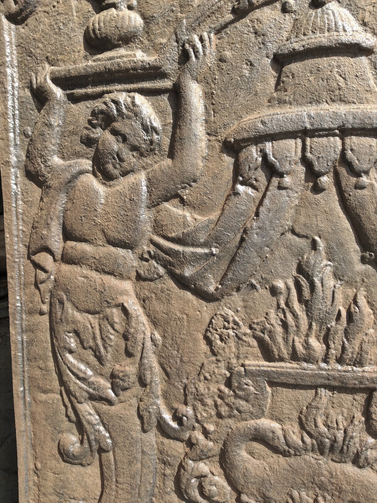 Fireback, cast iron, cultural depiction