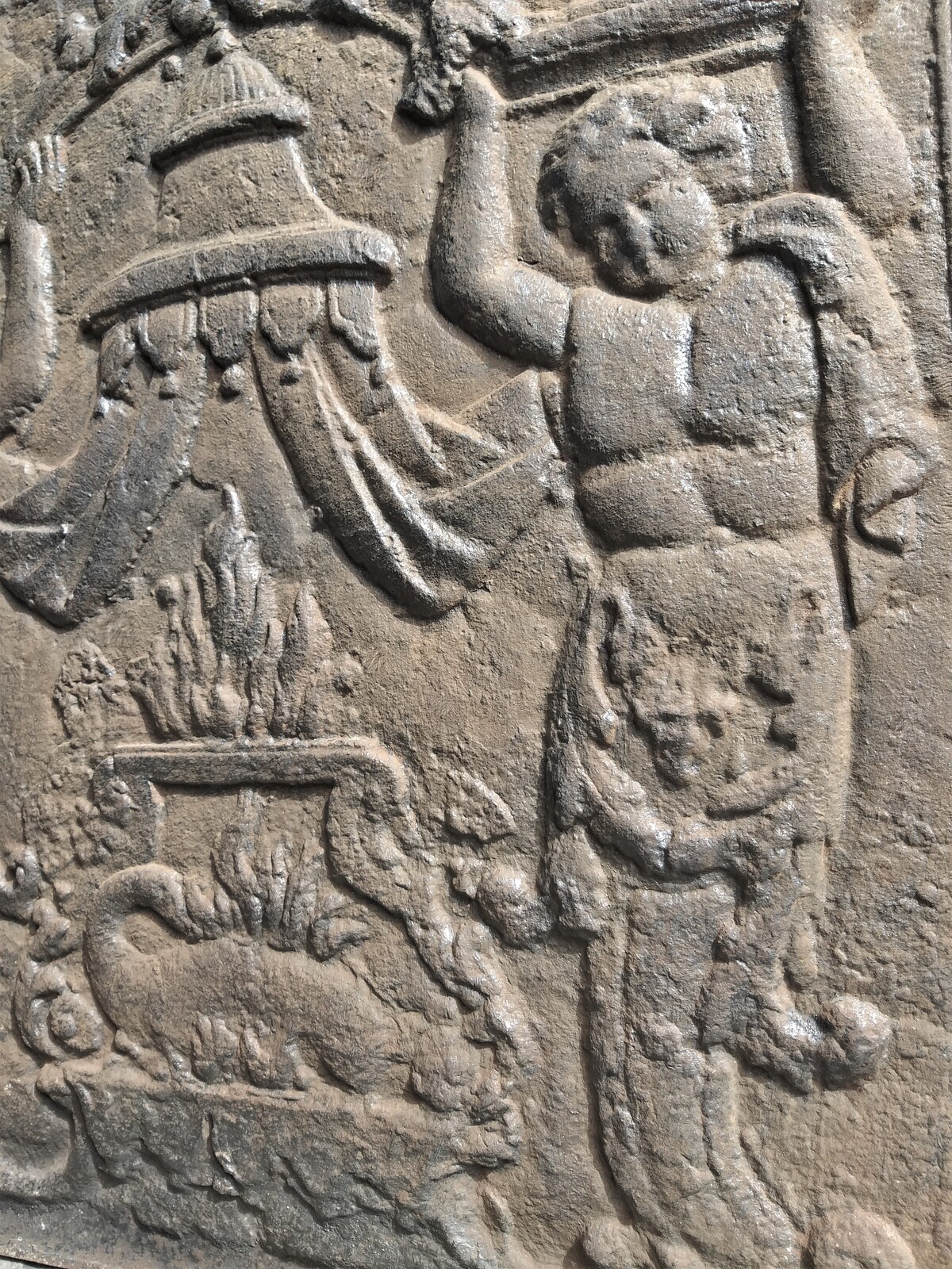 Fireback, cast iron, cultural depiction