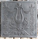 Fireback in cast iron Empire