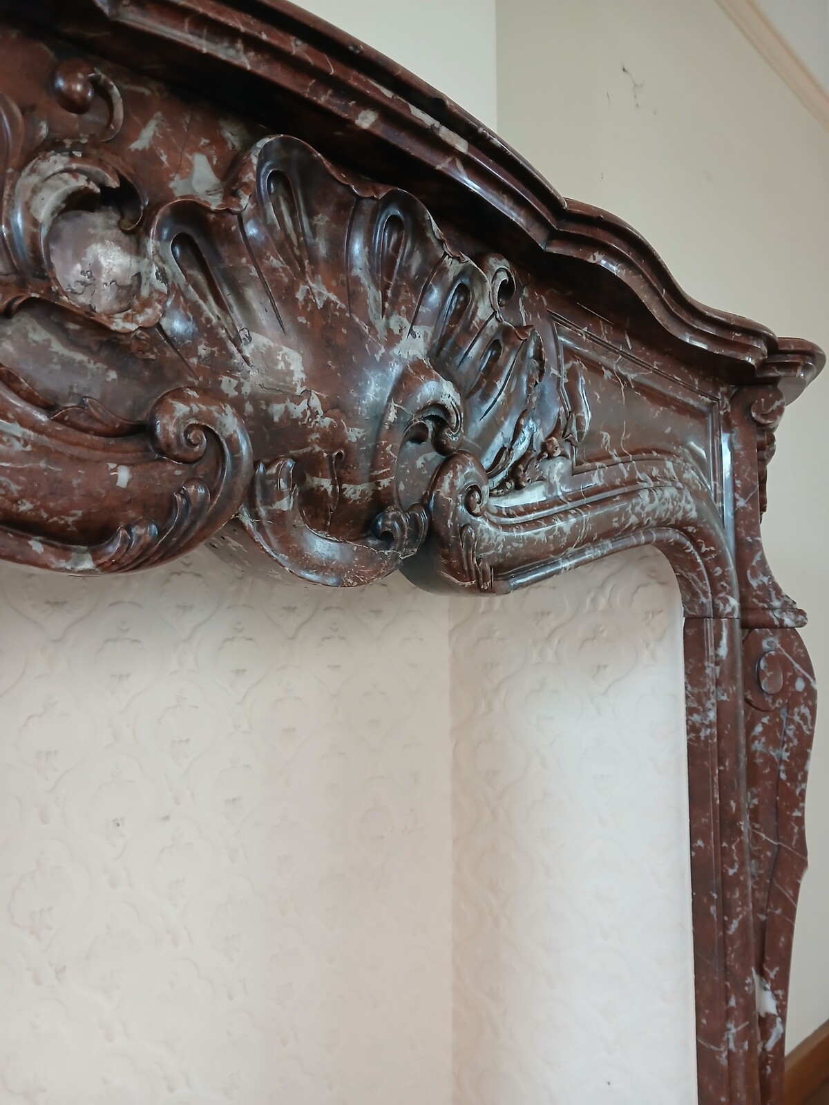 Large Louis XV fireplace made out of a striking-red marble