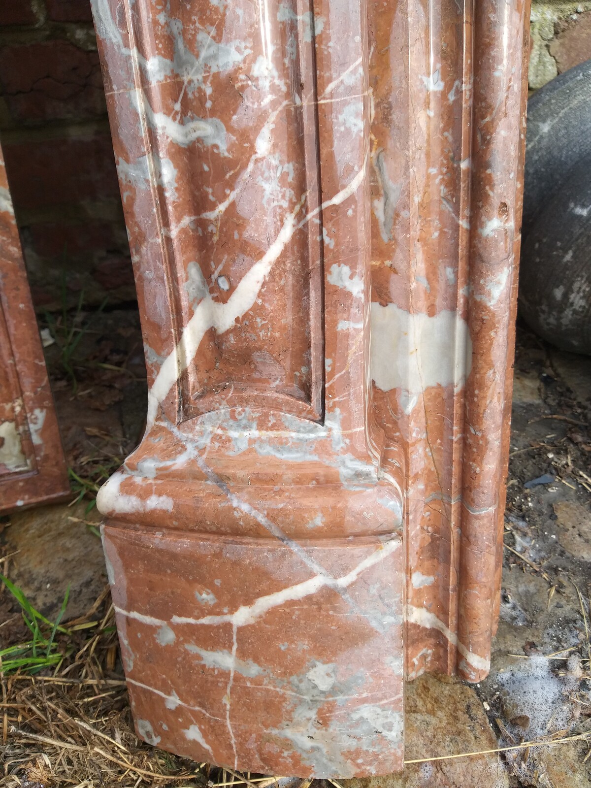 Louis XV style fireplace in soft brown-orange marble