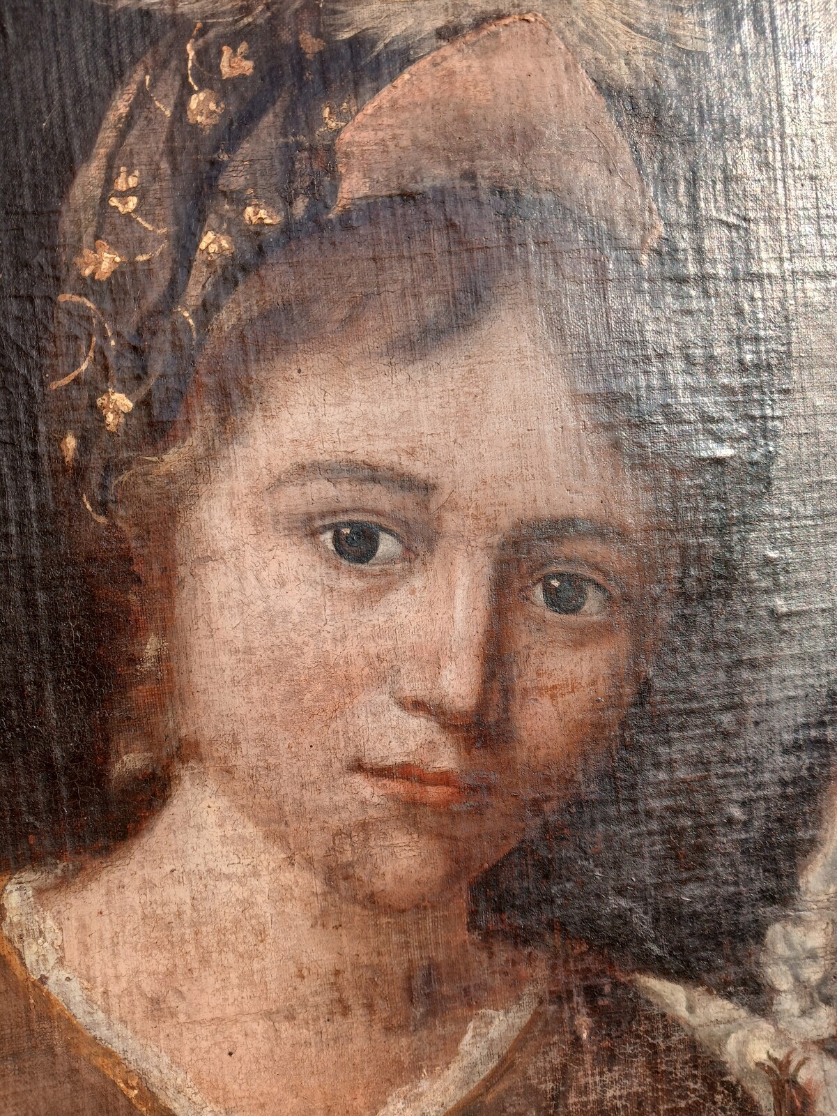 Portrait of a mother and daughter with a bouquet of flowers.