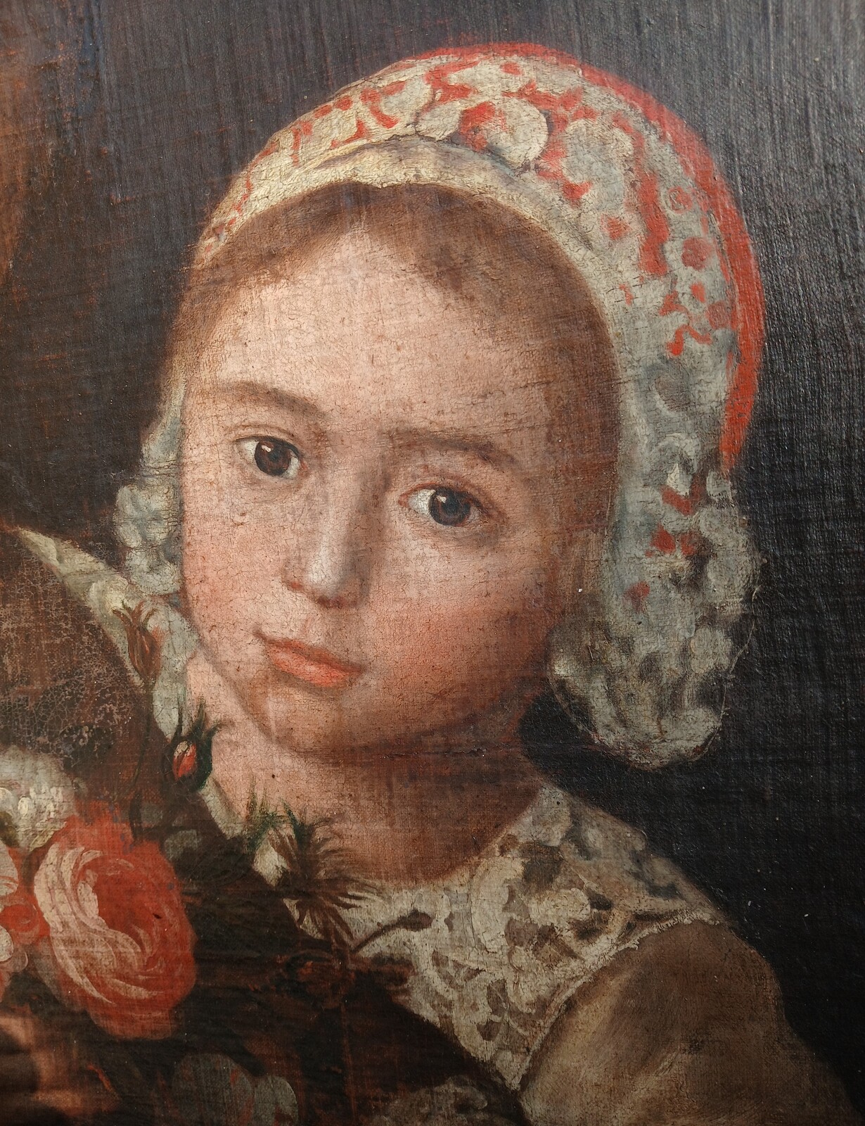 Portrait of a mother and daughter with a bouquet of flowers.